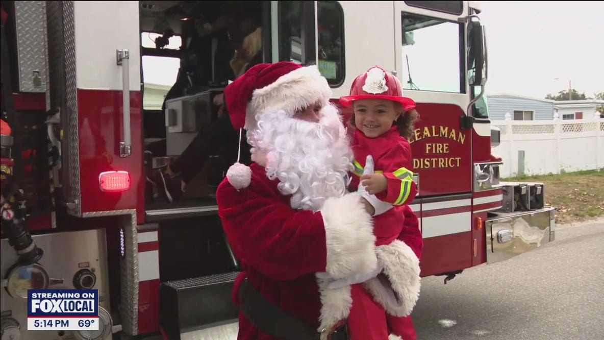Lealman firefighters deliver Christmas gifts
